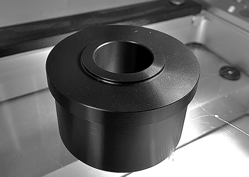This Dry Hub our of Virgin Black UHMW was machined on one of our 7 CNC turning centers. UHMW is a great wear resistant material.